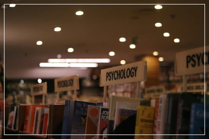 A collection of inspiring self help books on a bookshelf